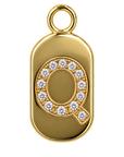 Gold diamond encrusted letter Q tag