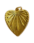 gold filled textured heart charm on transparent background