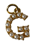 Gold pearl letter G charm on transparent background
