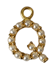 Gold pearl letter Q charm on transparent background