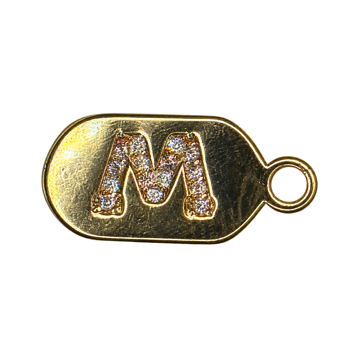 Gold diamond encrusted letter M tag