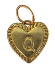 Gold heart filled letter Q charm on transparent background