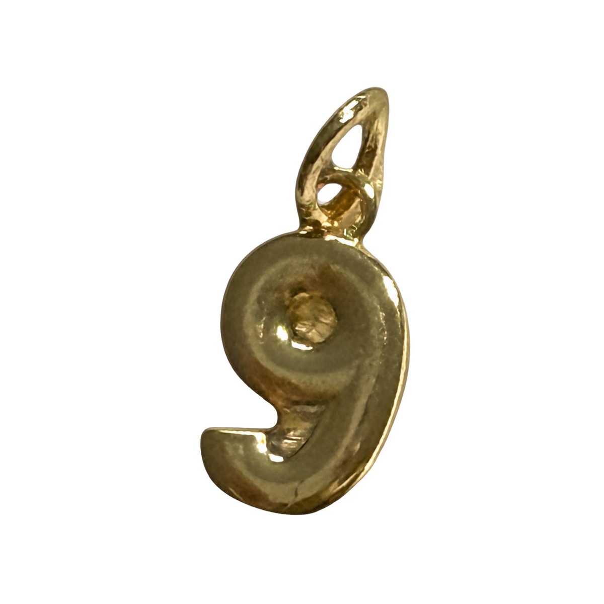 Number Nine Charm with natural gold finish on transparent background