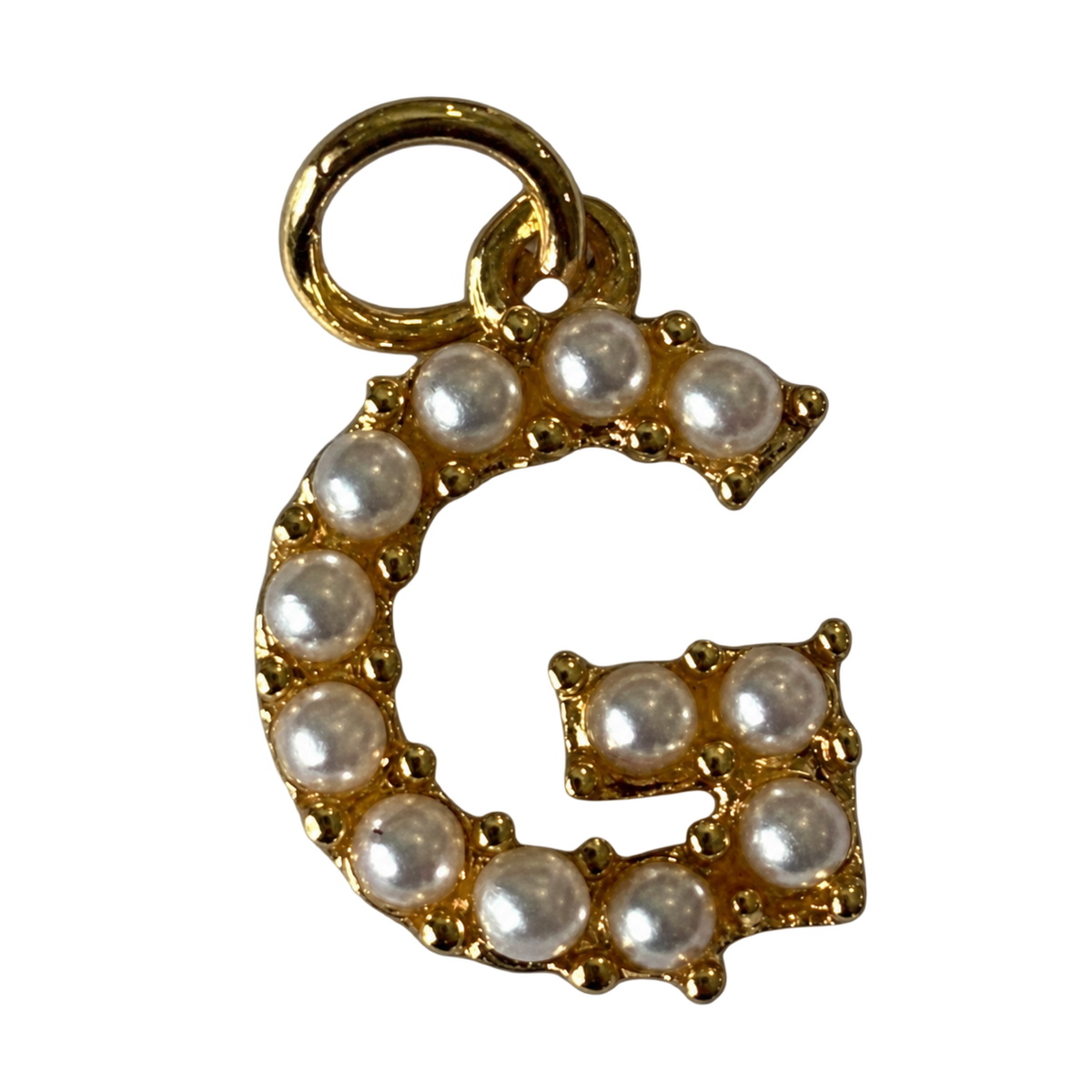 Gold pearl letter G charm on transparent background