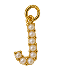 Pearl letter J charm with gold setting on transparent background