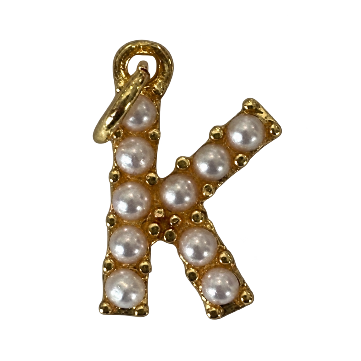 Gold pearl letter K charm on transparent background