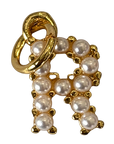 Gold pearl letter R charm on transparent background