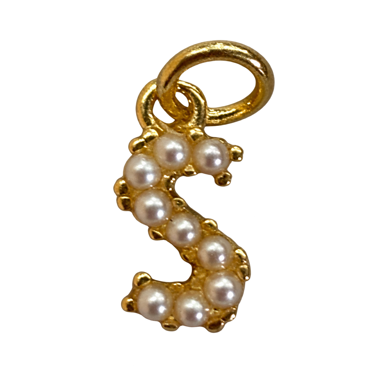 Gold pearl letter S charm on transparent background