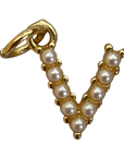 Gold pearl letter V charm on transparent background
