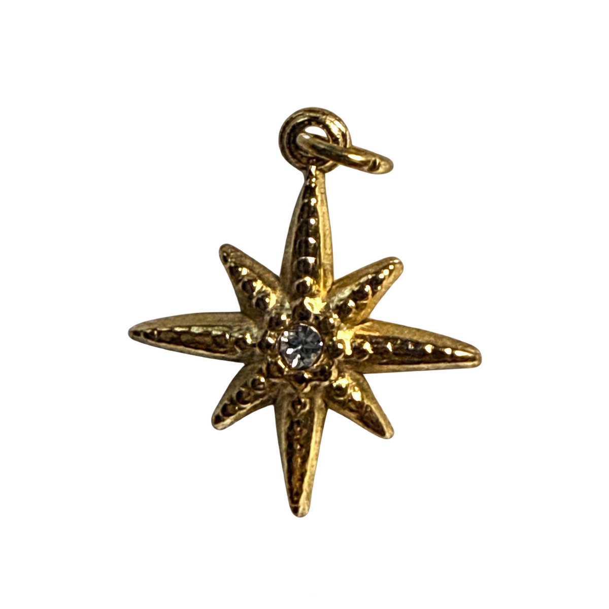 PVD Gold Plated Starburst Charm on transparent background