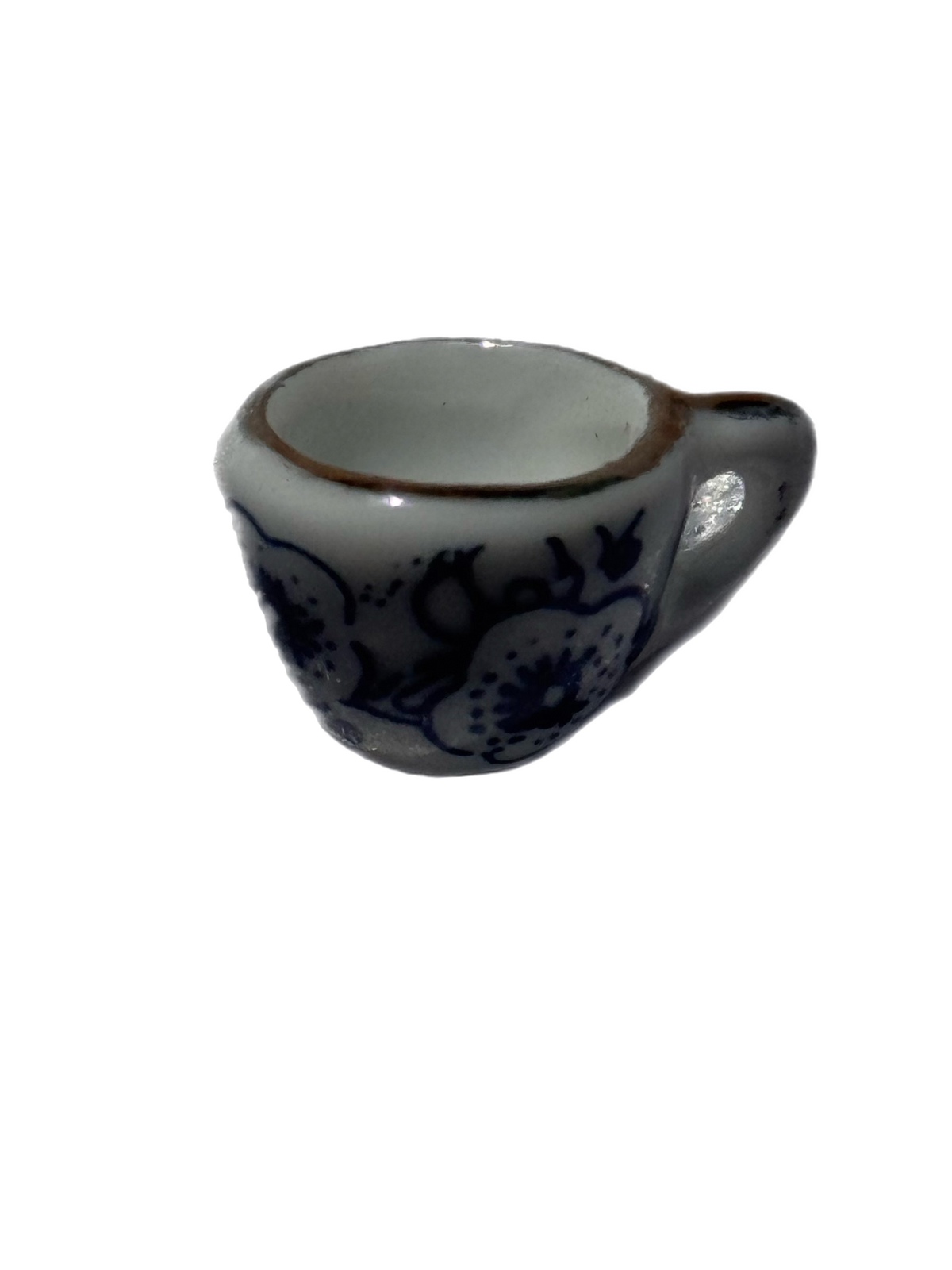 Tea time cup jewelry charm on a transparent background